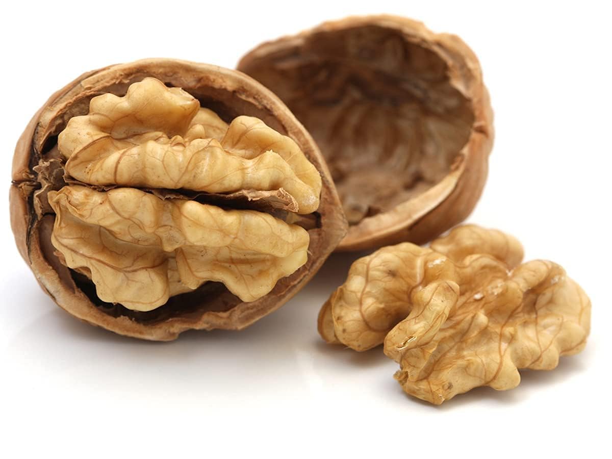 https://crunchynut.shop/uploads/Walnuts Without Shell Broken Light Half Color